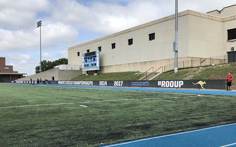 Mesh Banner Fence Wraps for UMKC Athletic Department in Kansas City, Missouri