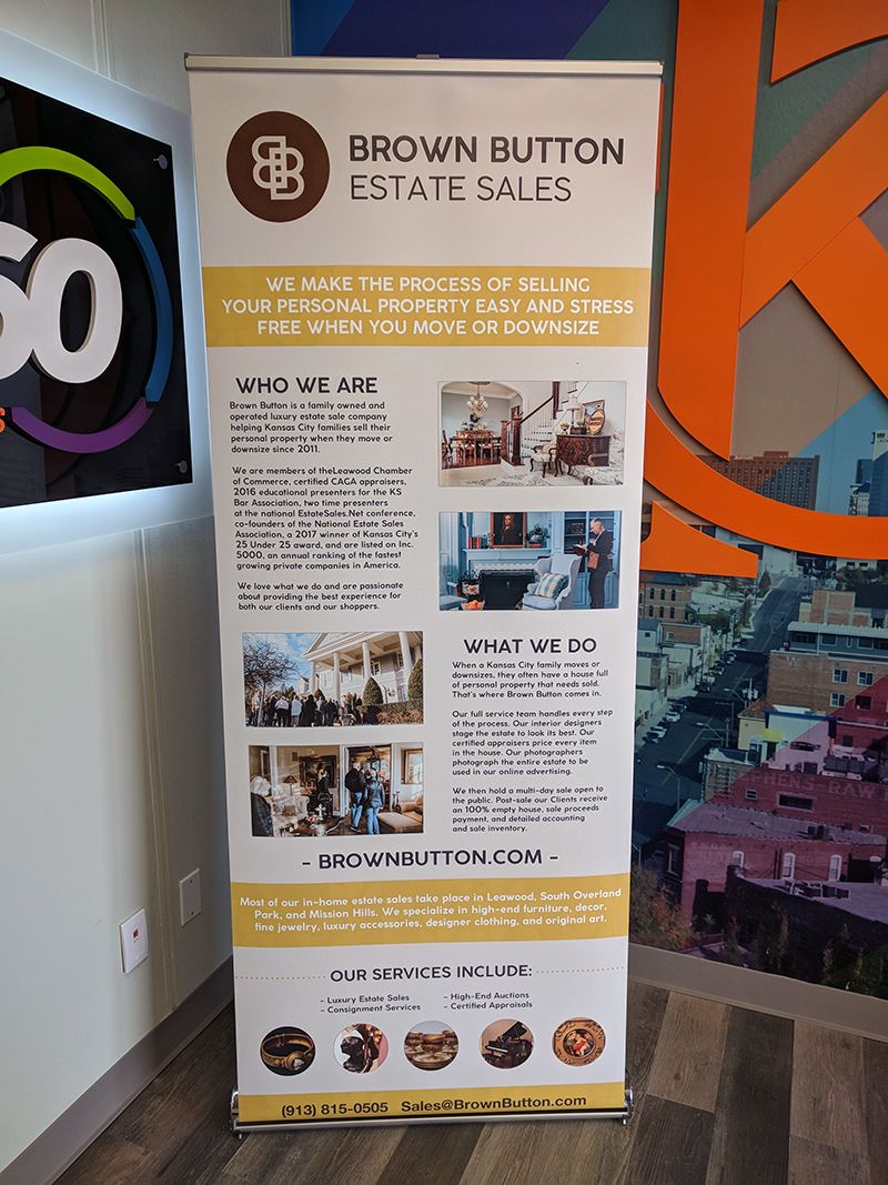 Retractable Banner Stand for Brown Button Estate Sales in Kansas City, Missouri