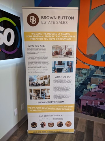 Retractable Banner Stand for Brown Button Estate Sales in Kansas City, Missouri