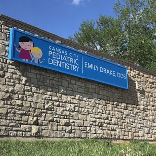 Exterior Acrylic Sign Insert for Existing Illuminated Lightbox for Kansas City Pediatric Dentistry in Kansas City, Missouri