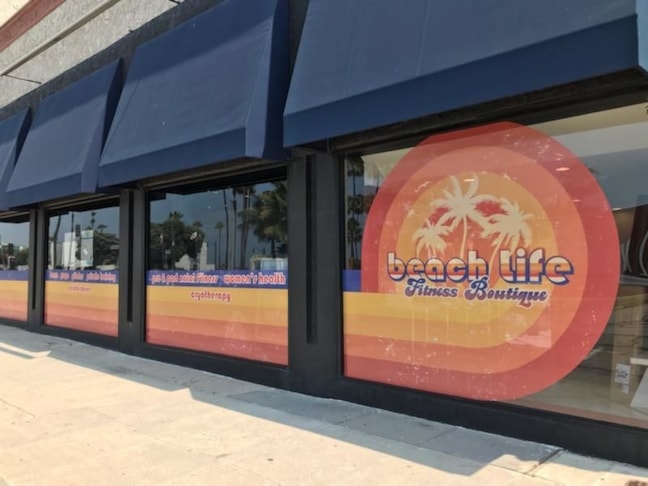 Peforated Vinly Storefront Winow Logo and Graphics