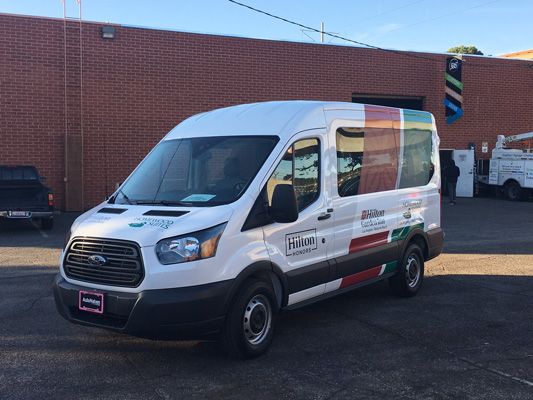 partial wrap digitally printed window perf installation we-3.jpg