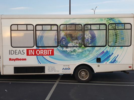 aytheon shuttle vehicle wrap avery digital print installation el segundo image360 uv lamination bus (2).jpg