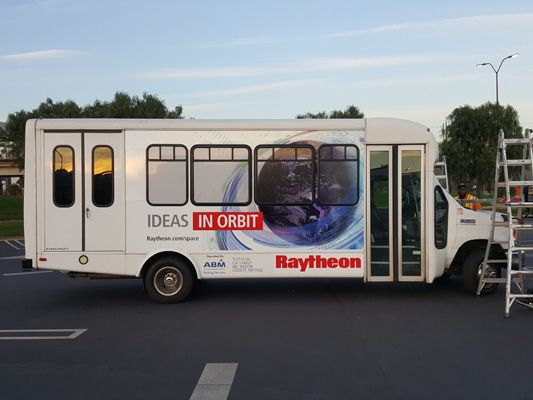 raytheon shuttle vehicle wrap avery digital print installation el segundo image360 uv lamination bus.jpg