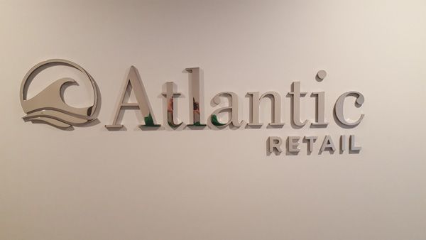 reflective 3d dimensional sign interior logo direct mount installation atlantic retail los angeles.jpg