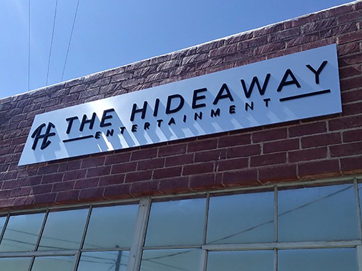 The Hideaway los angeles brushed aluminum installation half inch medex acrylic 3 dimensional lettering.jpg