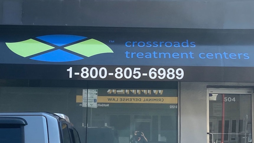 Façade branding using vinyl decals for Crossroads Treatment Centers in Philadelphia.
