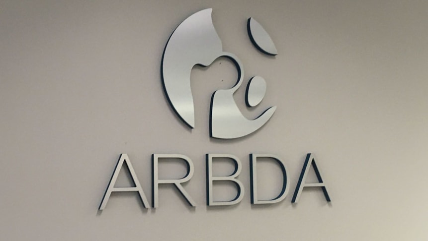 Dimensional lettering created by foam lettering faced with brushed aluminum.