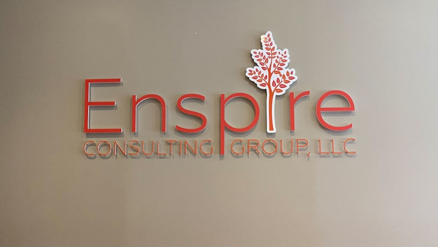 Acrylic dimensional lettering for Enspires lobby wall. The tree is made of acrylic overlaid with vinyl.
