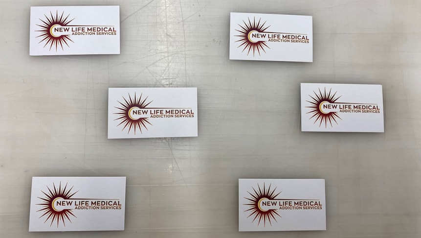 The back of business cards designed for New Life Medical.