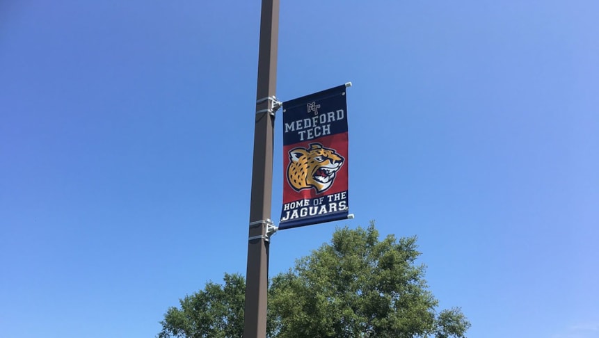 Pole banners we designed and installed all over BCITs Medford campus lots.