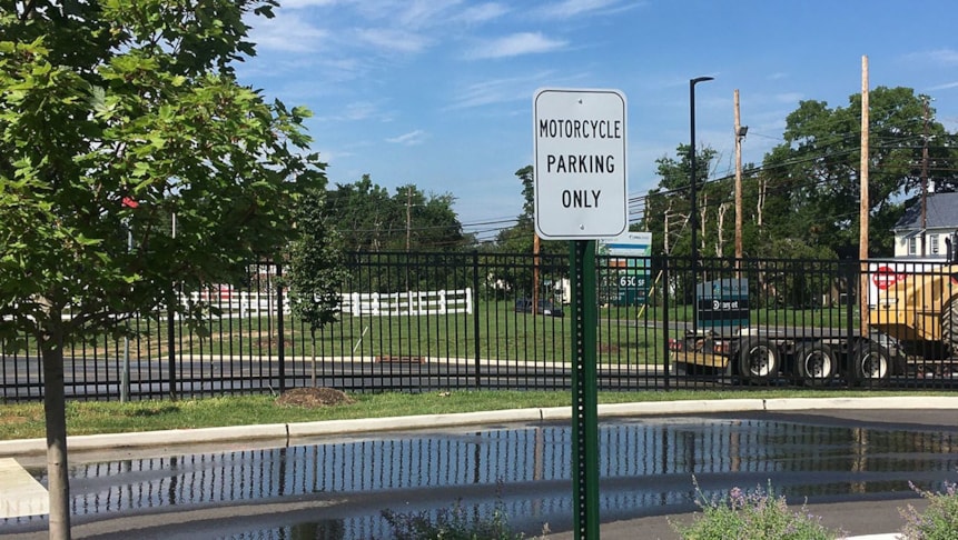 Designated parking lot signage printed and installed.