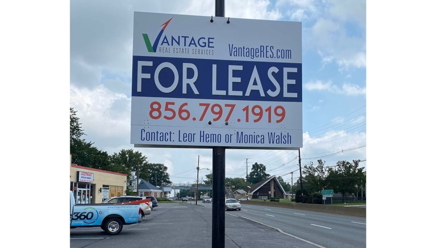 A spin on the traditional post & panel sign. Vantage was looking to mount their property leasing sign on a lightpost.