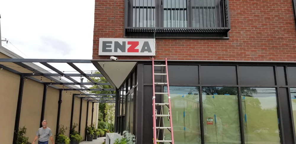 Installing Push Thru Acrylic Lightbox for ENZA