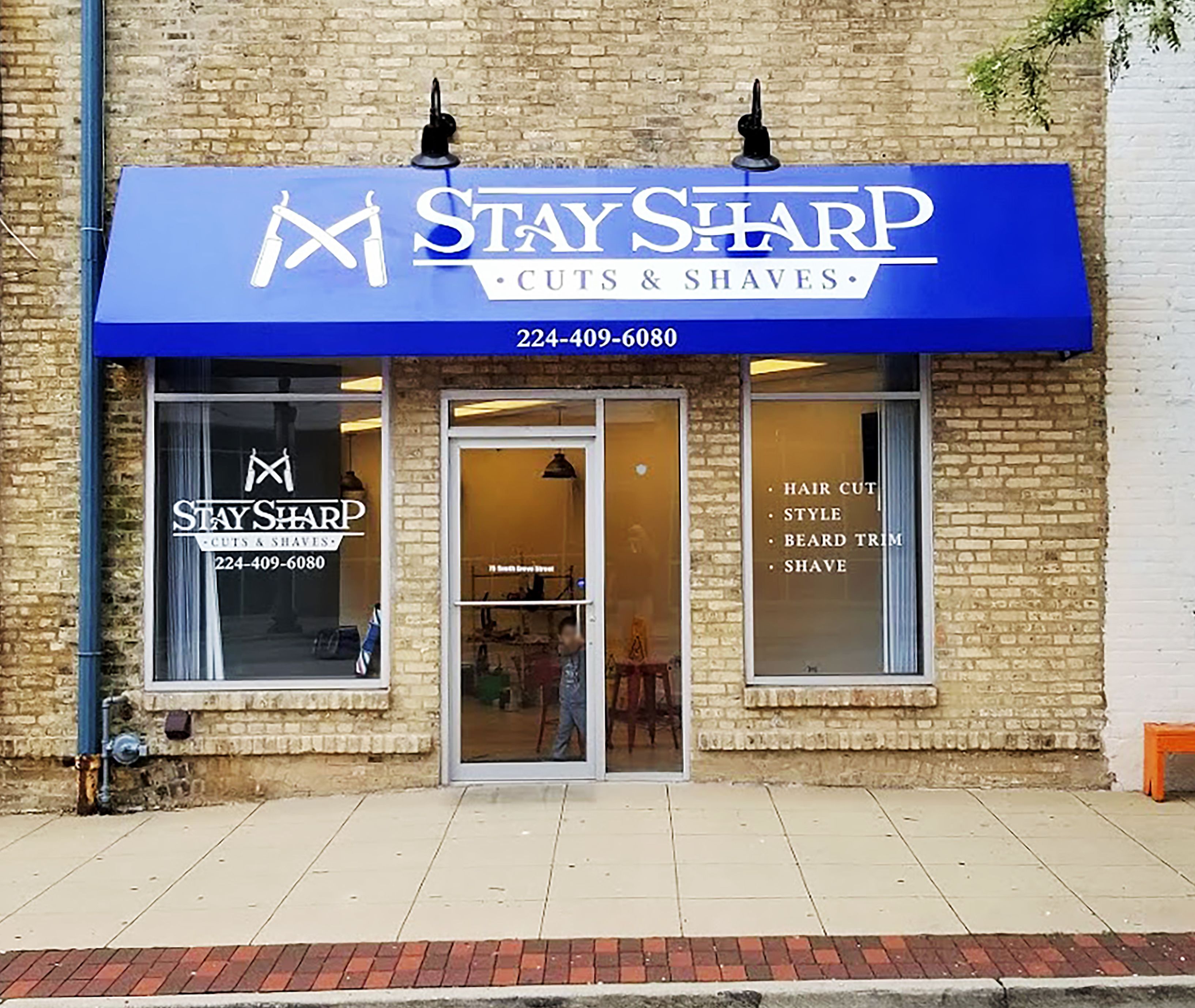 Exterior Storefront Awnings for Stay Sharp Cuts & Shaves in Elgin, IL