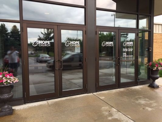 Exterior Cut Vinyl Logo and Office hours for Hope Church Oakdale in Oakdale, MN