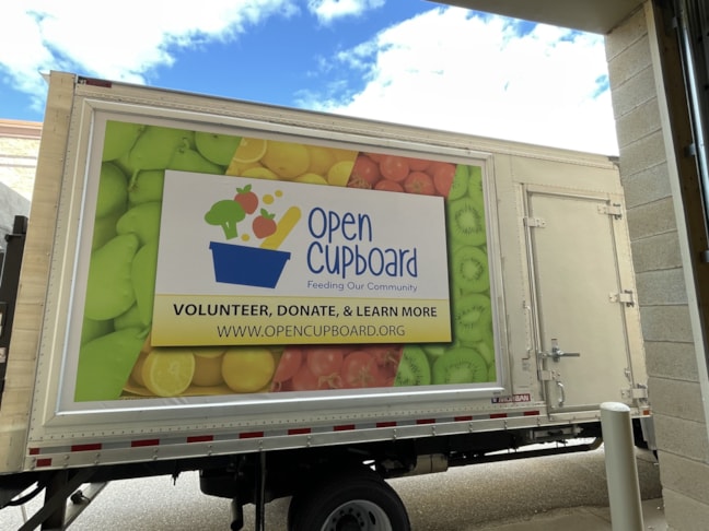 Wall-Mount Frames | Truck Banner Frame System with easily changeable banner graphic.