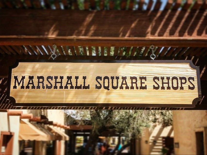 Architectural sandblasted carved signage ethical property management