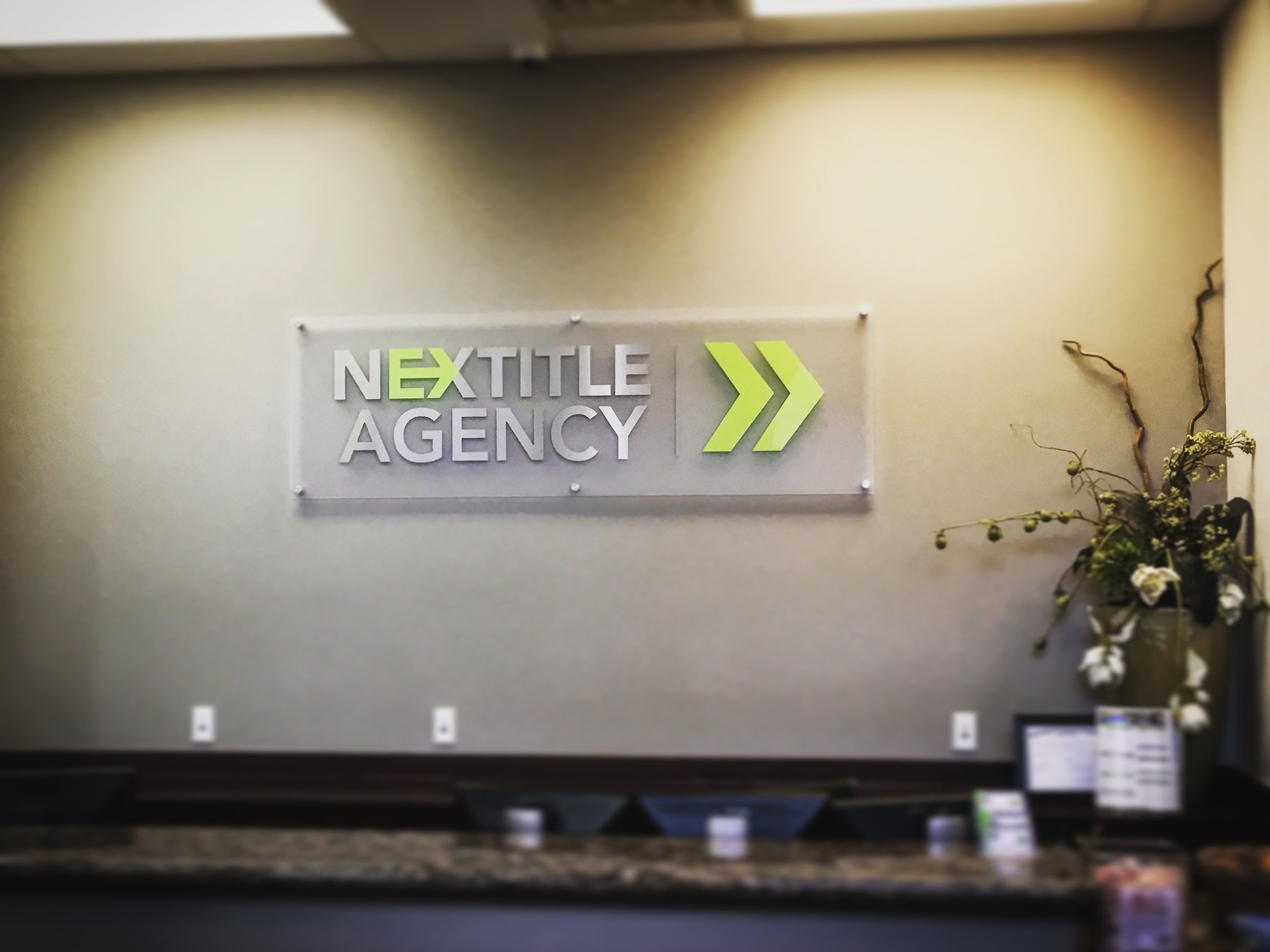 architectural reception signage Nextitle Chandler