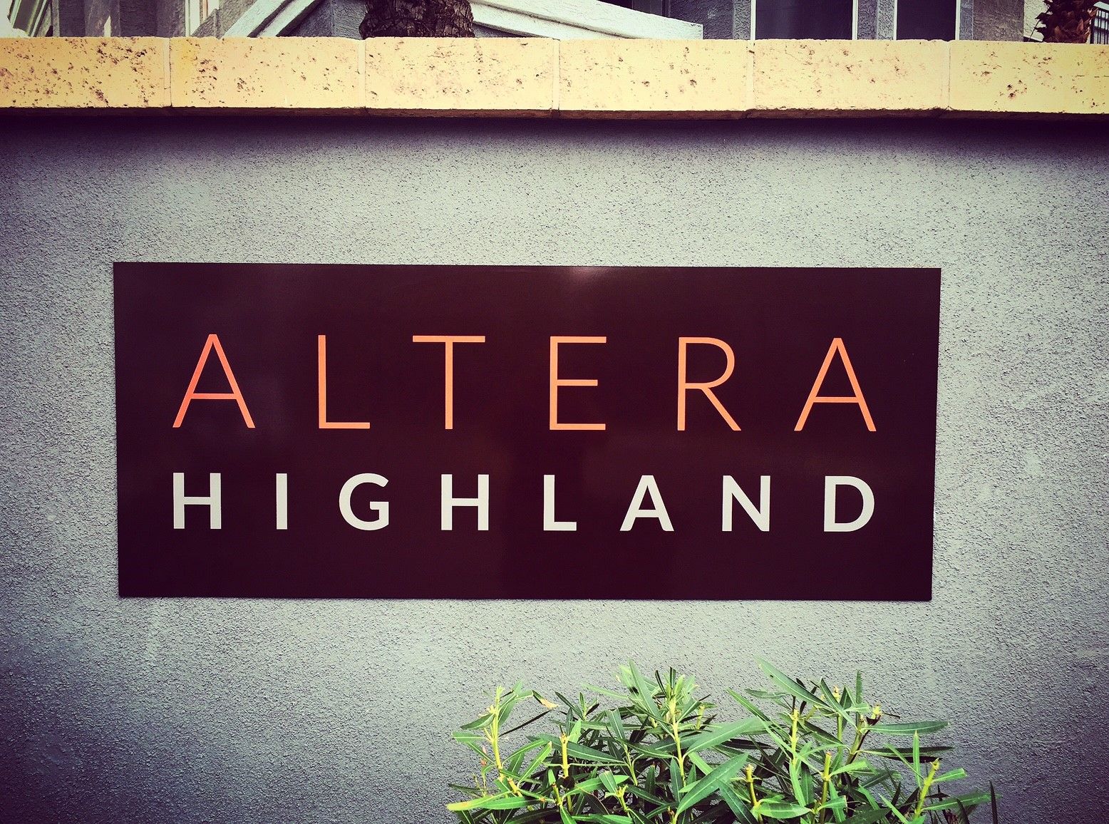 Architectural building wall signage Alterra Highlands