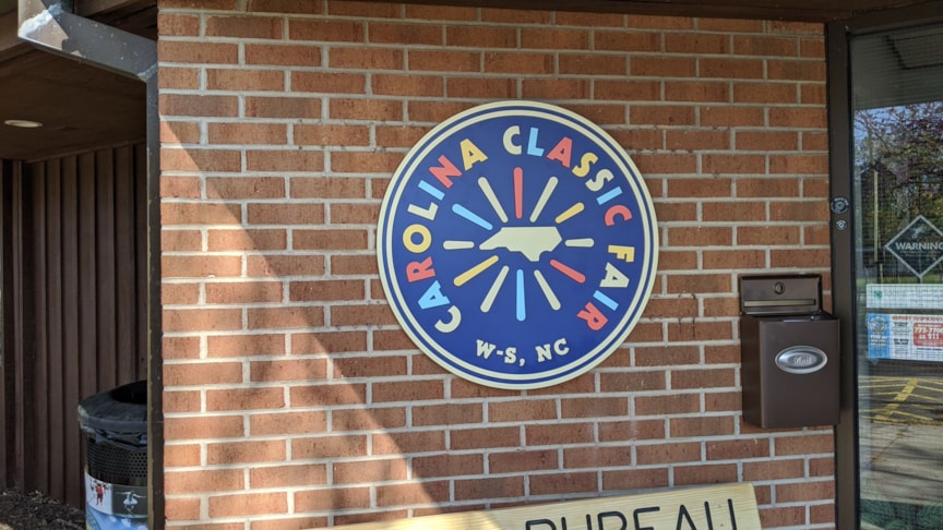 Dimensional Circular Stud Mounted Sign for Carolina Classic Fair in Winston-Salem, NC