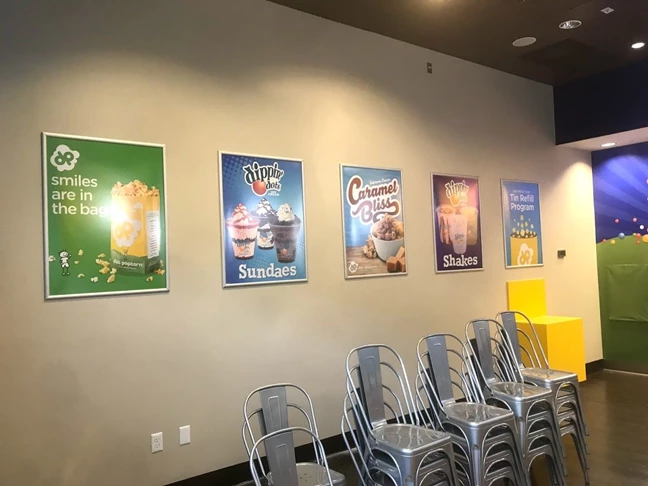 Wall-Mount Poster Frames for Dippin Dots and Doc Popcorn