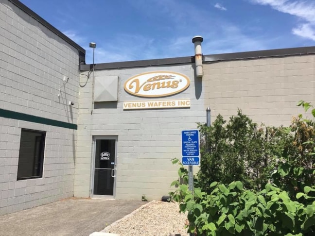 Acrylic letters and logo mounted on MDO with an acrylic border