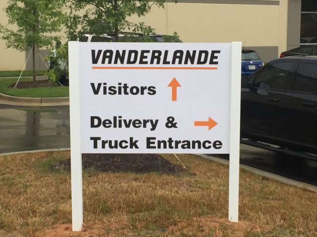 Post and Panel directional sign in Acworth