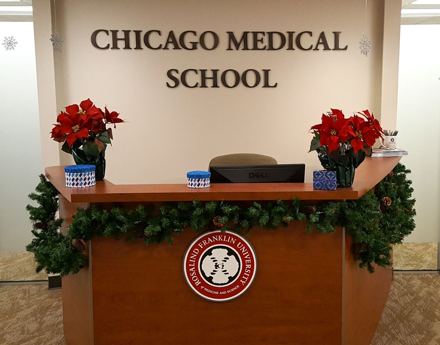 Cast tooled metal plaque painted school colors