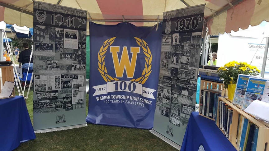 Banner stands for Warren HS 100th Anniversary