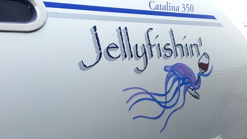 Name with graphic on sides of sailboat at Sail Place Kenosha WI