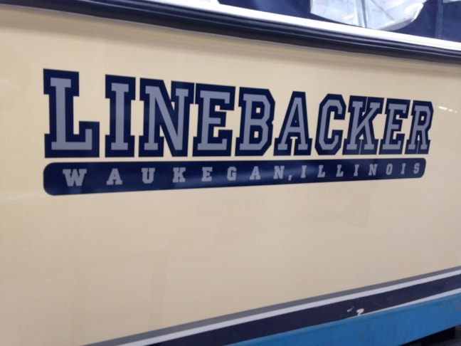 Collegiate look graphic applied to sailboat