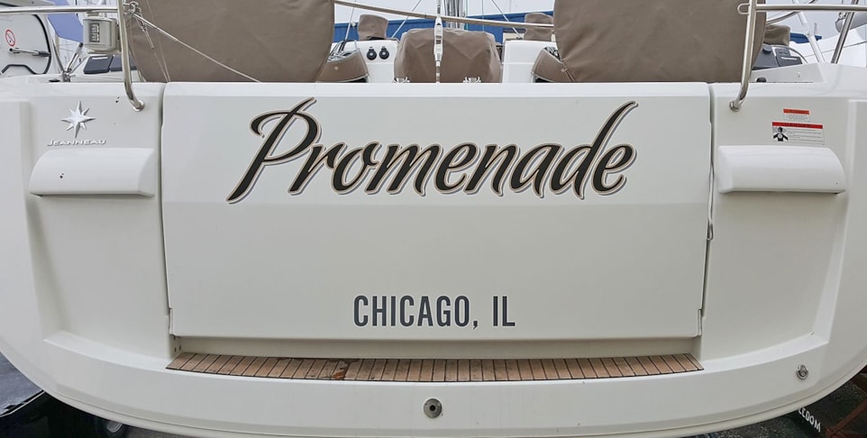 Boat name in metallic gold and black with pewter drop shadow 