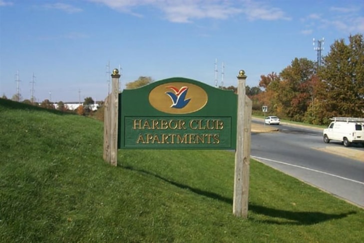 Carved wooded post sign