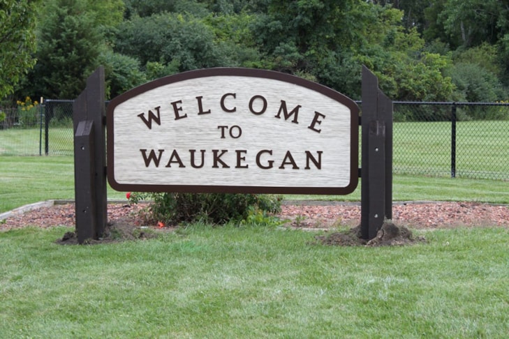 Sandblasted and painted redwood sign 