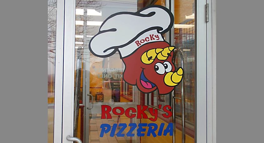 Window lettering and logo graphic at restaurant and video store in Lindenhurst, IL.