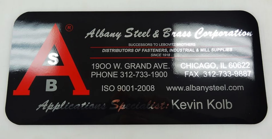 Magnetic enlarged business card with chrome and red on black