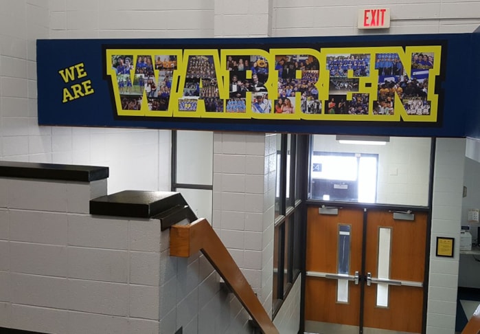 Logo with collage of pictures to celebrate diversity of student body  