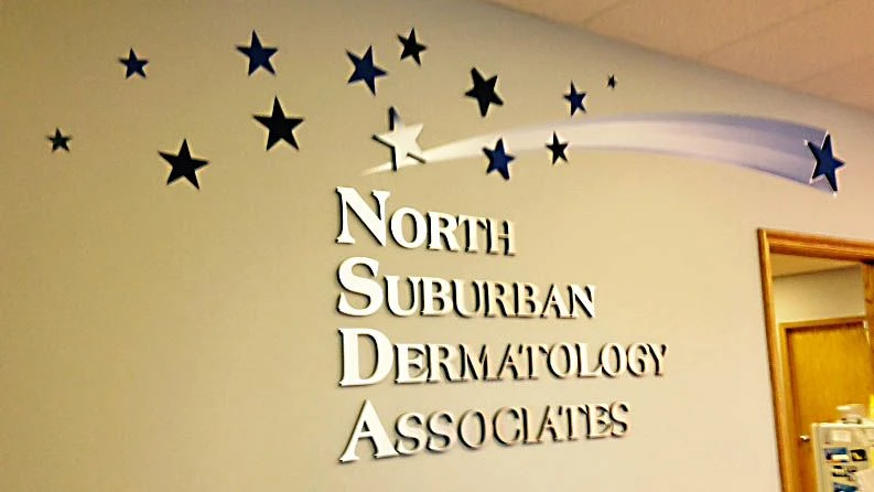 Mix of dimensional letters and stars with vinyl graphics for a healthcare facility in Gurnee.