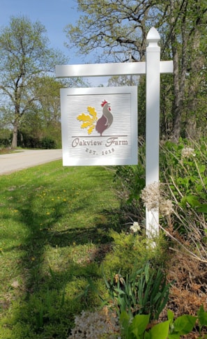 Custom carved, routed and painted roadside sign for farm.   HDU sign looks like wood.  Post is PVC.  Low maintenance