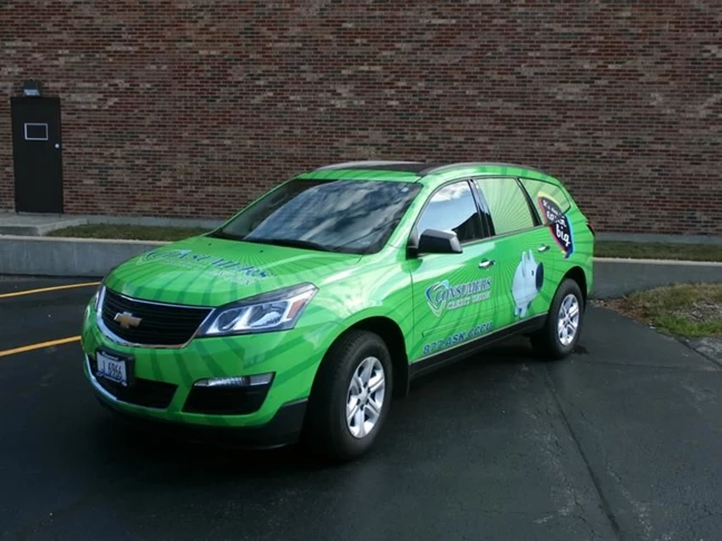 Full wrap on Chevy SUV designed by Signs Now Gurnee for Consumers Credit Union