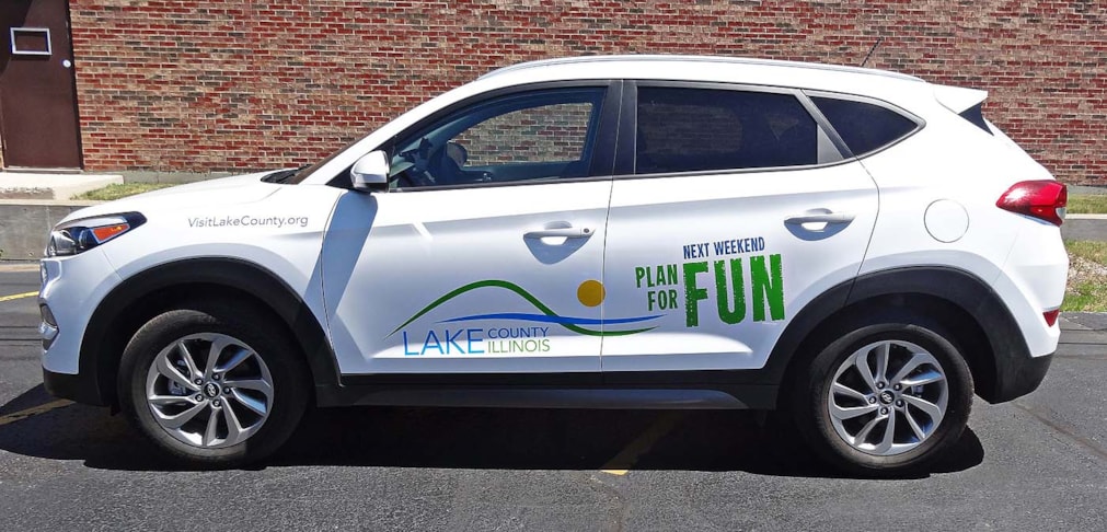 Logo and graphics on SUV for Lake County Convention and Visitors Center, Gurnee IL