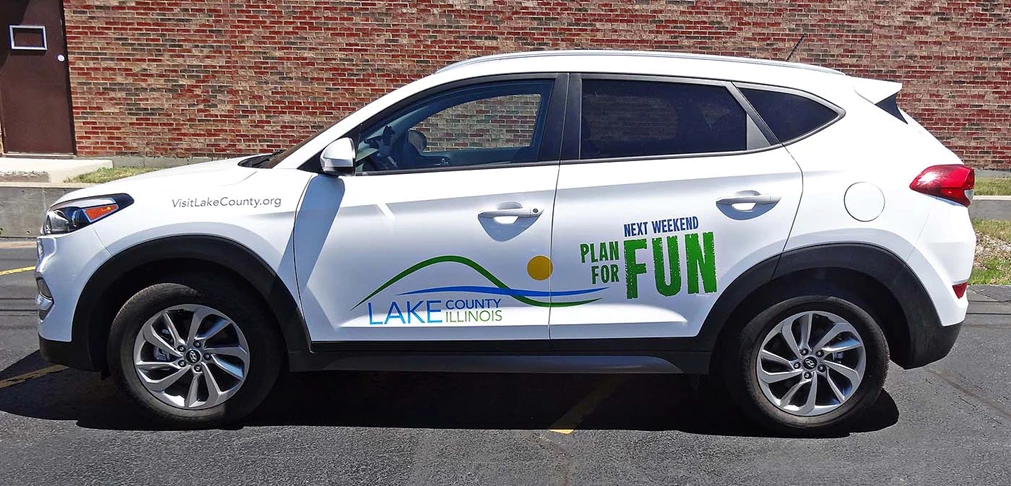 Logo and graphics on SUV for Lake County Convention and Visitors Center, Gurnee IL