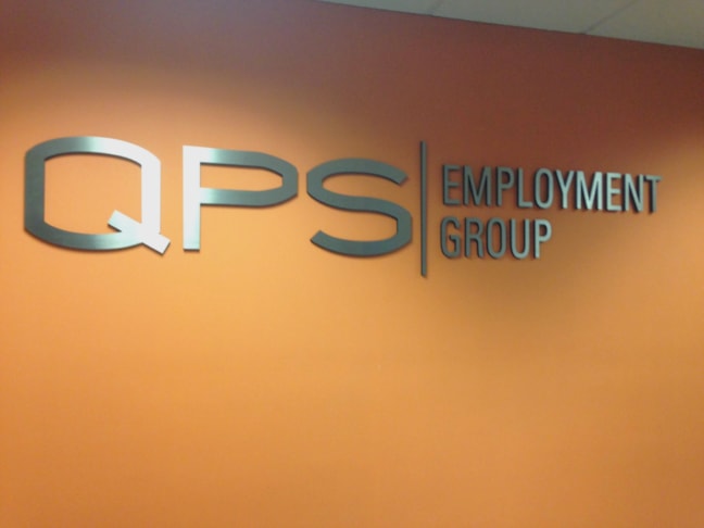 Metallic dimensional logo on wall in Gurnee IL