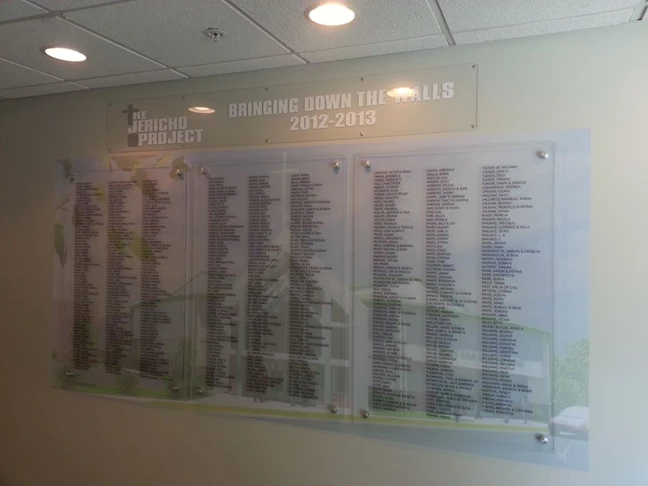 Acrylic panels with donor names and rendering of proposed building elevation