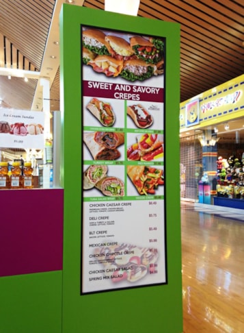 Illuminated menu with food images 