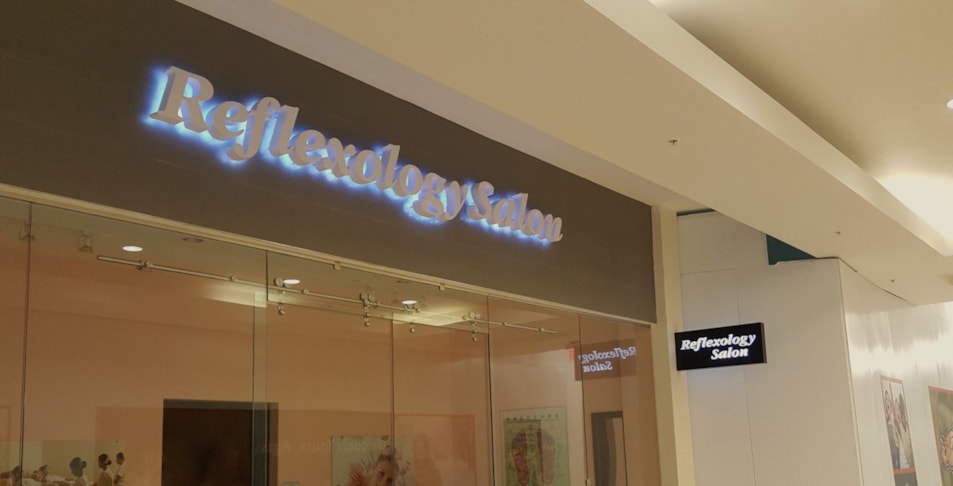 Reverse back lit channel letters at salon in mall. Vernon Hills