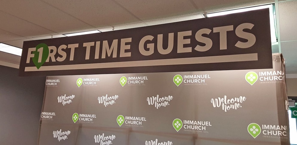 Sign for first time guest information counter at church in Gurnee, IL