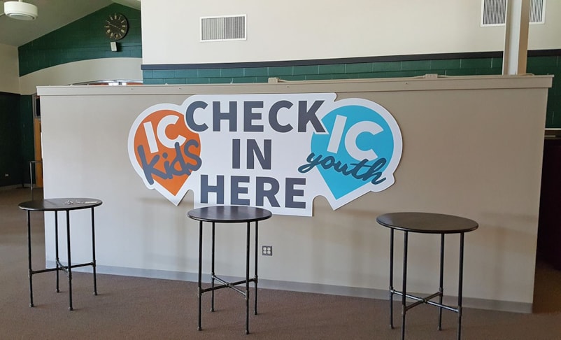 Check in area sign