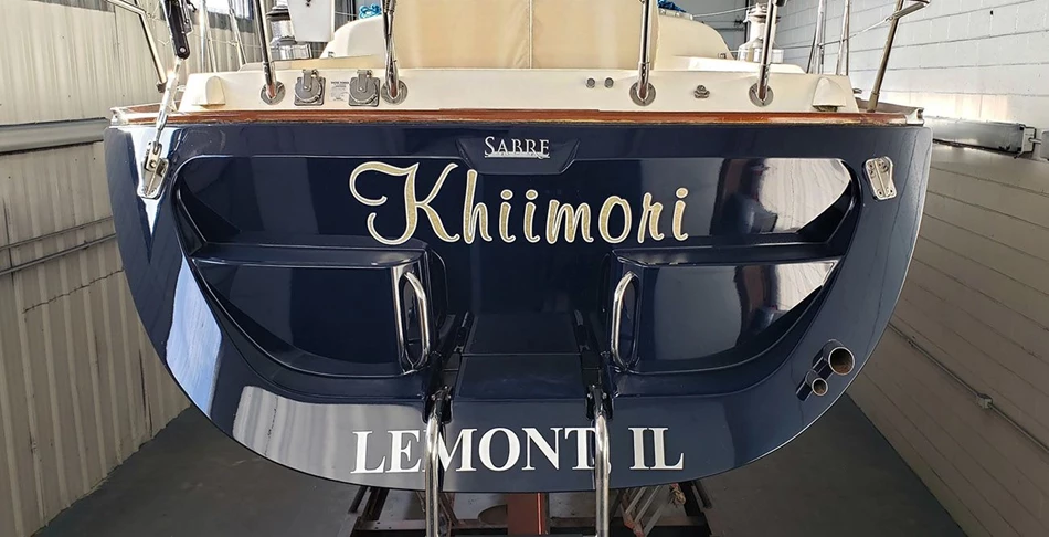Sailboat name lettering - gold leaf with white outline